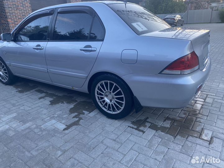 Mitsubishi Lancer 1.6 МТ, 2005, 300 000 км