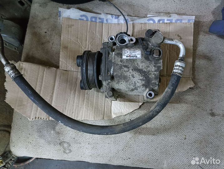 Компрессор кондиционера lancer 9