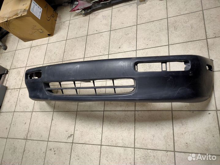Бампер передний Mazda Familia Новый