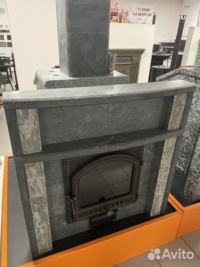 Чугунная печь для бани в облицовке