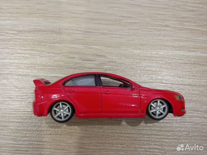 Burago машинка Митсубиси Лансер эволюшен 11317