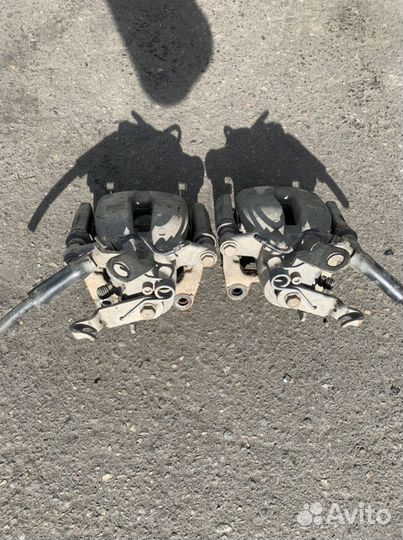 Суппорт тормозной задний Skoda Superb 2