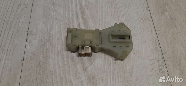 Устройство блокировки люка Indesit DM 066 C002973