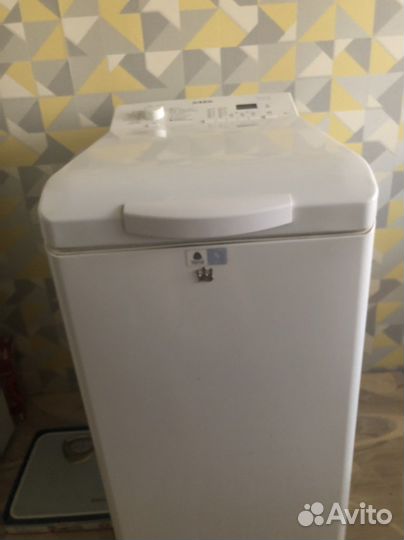 Стиральная машина с вертикальной загрузкой