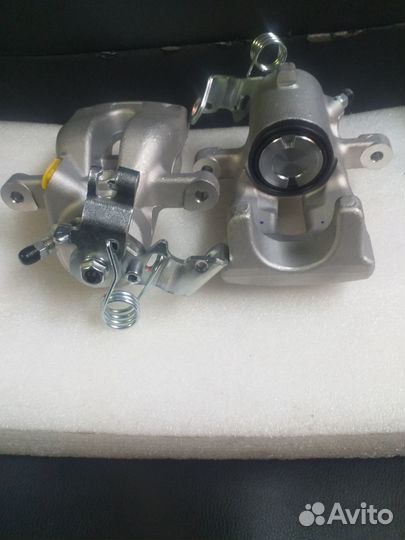 Суппорт задний Opel Zafira B