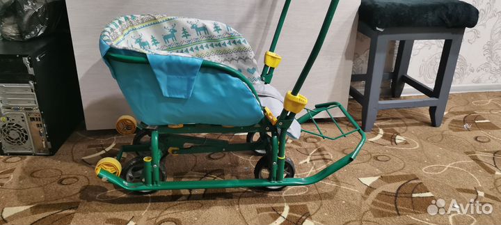 Детские санки с выдвижными колесами