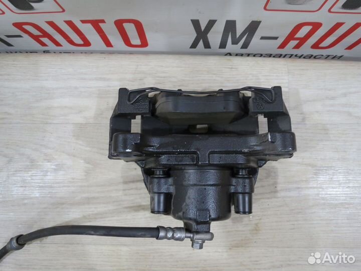 Суппорт тормозной передний правый VW Tiguan