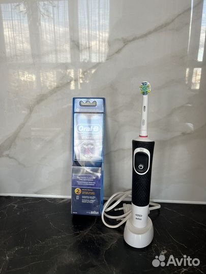 Электрическая зубная щетка braun oral b