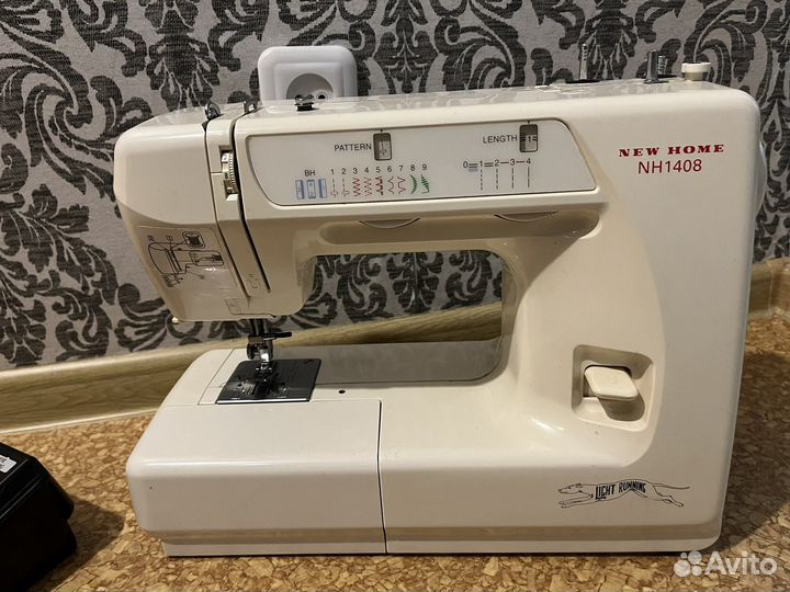 Швейная машина New Home 1408