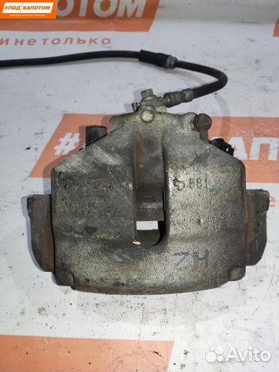 Суппорт тормозной передний левый Skoda Fabia