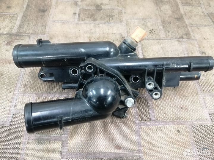 Корпус термостата g4kd Kia Hyundai 256302gxxx