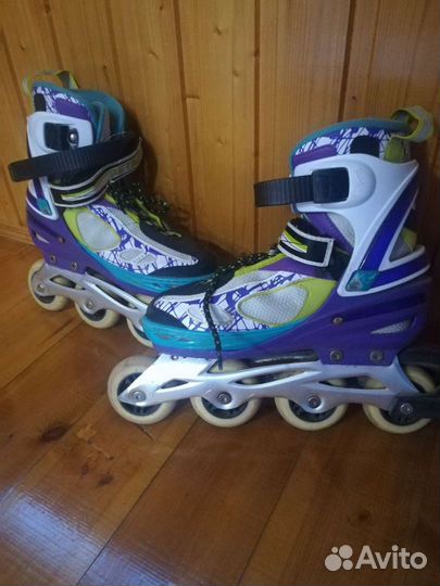 Роликовые коньки