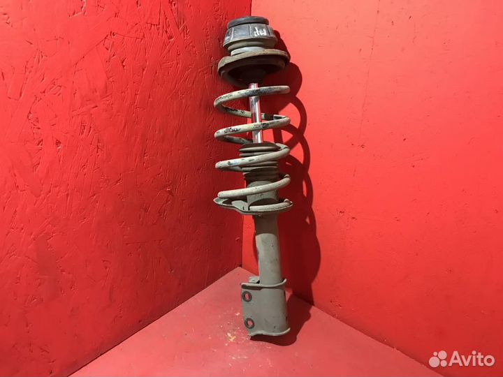 Амортизатор передний Рено Логан 1