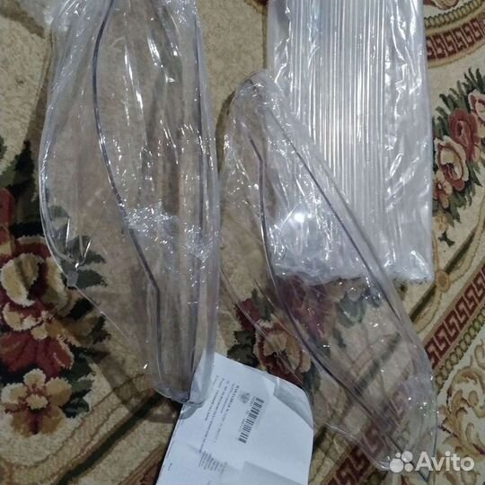 Стекло Фар bmwЕ60 E61 цена указана за два стекла