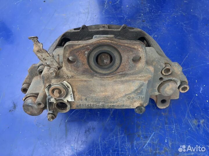 Тормозной суппорт передний левый Рено Премиум DCI