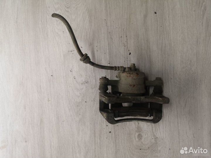 Суппорт передний правый Chevrolet Aveo T250