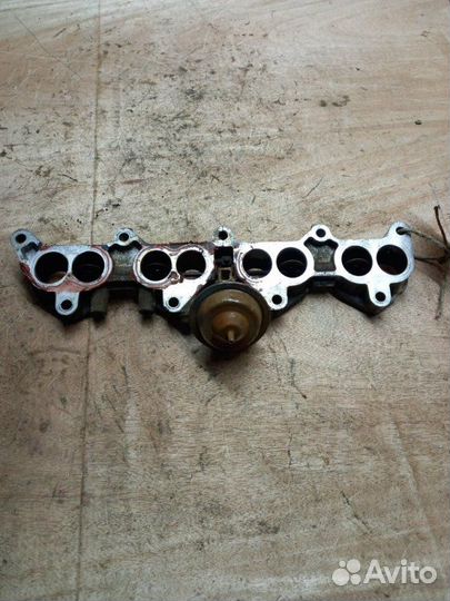 Механизм изменения геометрии впускного коллектора