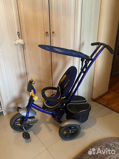 Трехколесный велосипед с ручкой