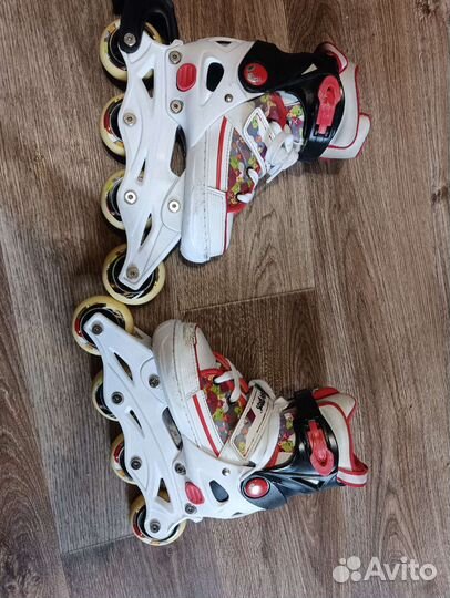 Роликовые коньки