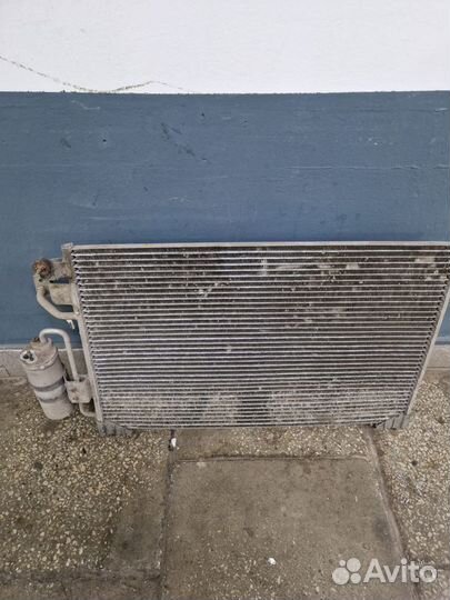 Радиатор кондиционера Chevrolet Evanda