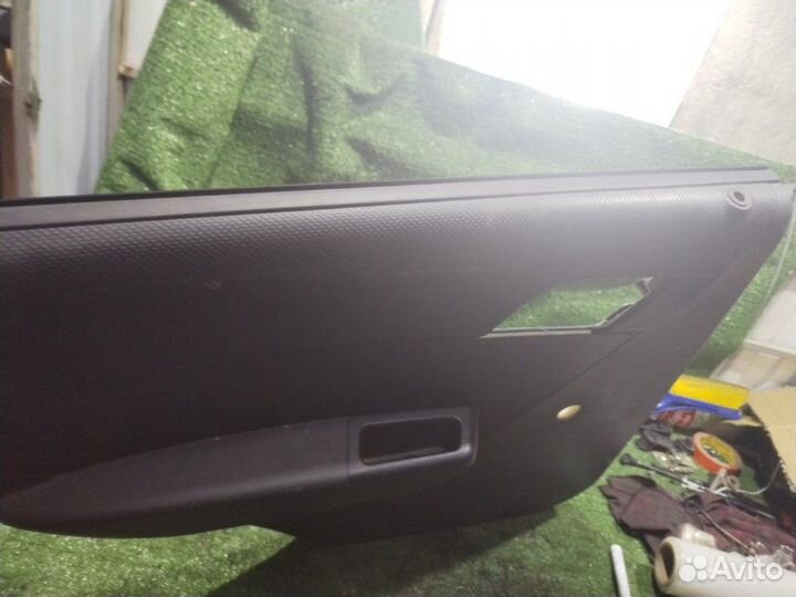 Обшивка боковой двери задняя левая Chevrolet Aveo