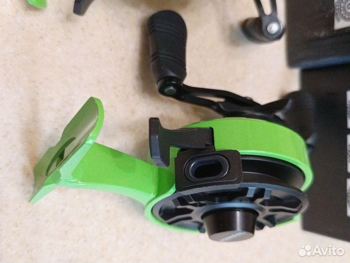 Катушка мультипликаторная зимняя с курком