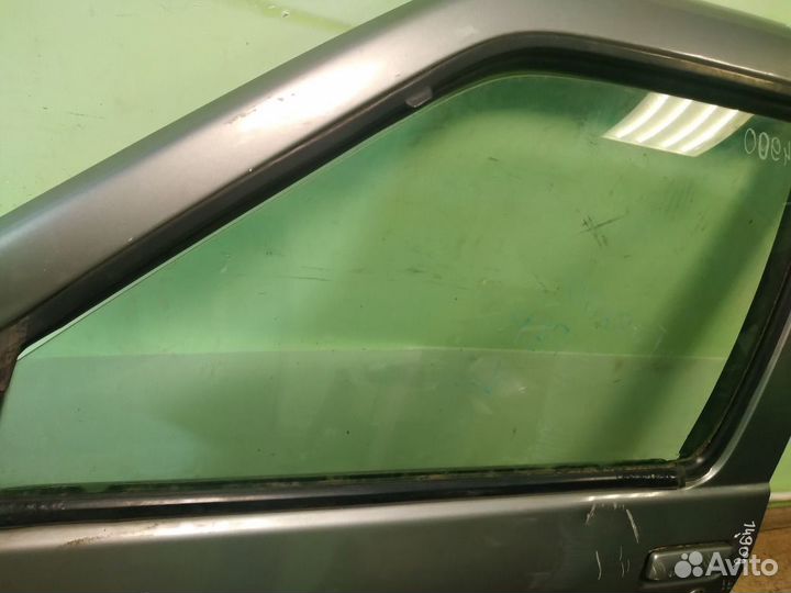 Стекло двери переднее левое Nissan Terrano R50