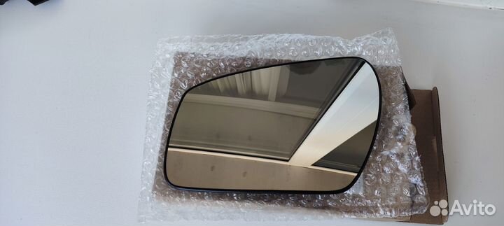 Стекло зеркала левого c подогревом на Ford Focus
