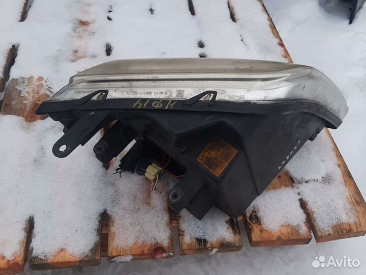 Фара левая Форд Турнео Коннект оригинал