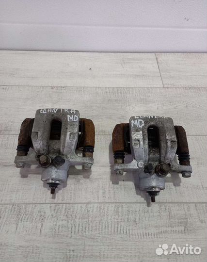 Суппорт задний левый Hyundai Elantra MD