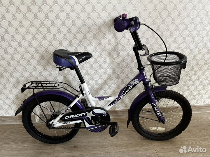 Велосипед с боковыми колесами