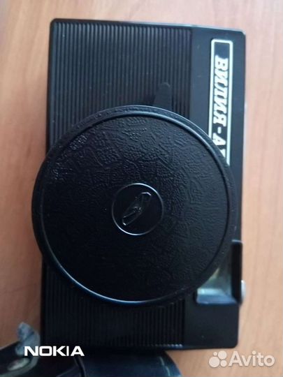 Плёночные фотоаппарат и вспышка Чайка