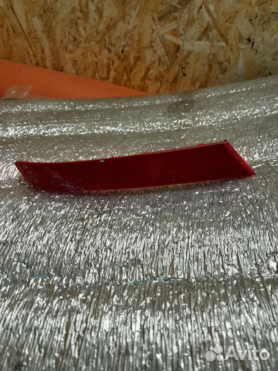 Светоотражатель катафот заднего бампера,левый