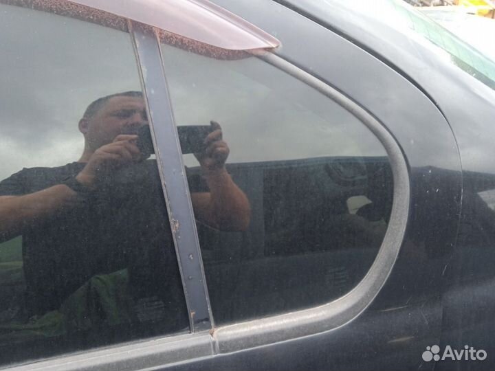 Стекло глухое заднее левое Nissan Primera P11