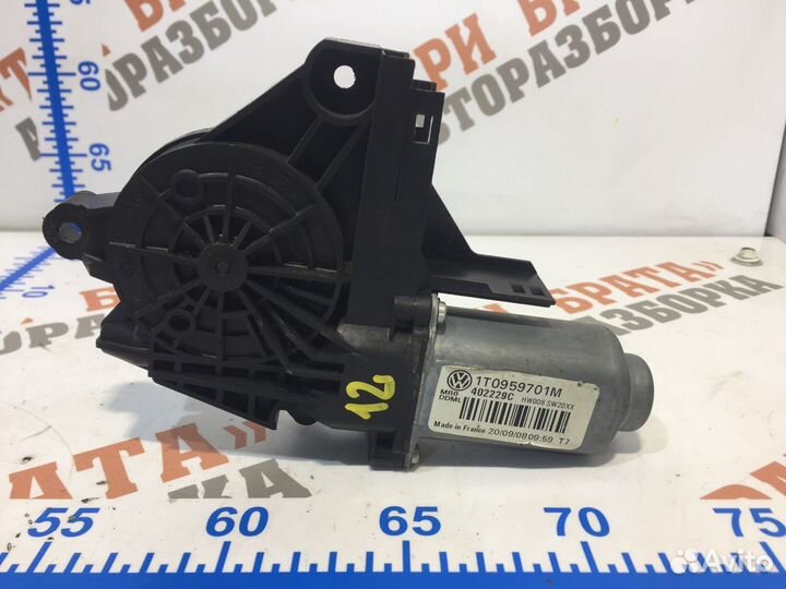 Моторчик стеклоподъемника передний левый Лев