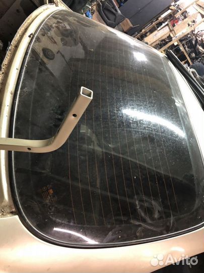 Заднее стекло Kia Spectra