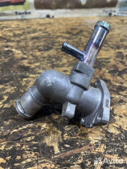 Фланец термостата Хендай Элантра HD