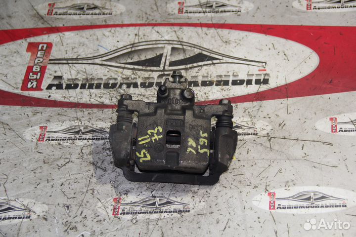 Суппорт зад лево c Subaru Impreza GGD EL154