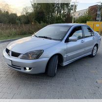 Mitsubishi Lancer 1.6 MT, 2006, 230 058 км, с пробегом, цена 397 000 руб.