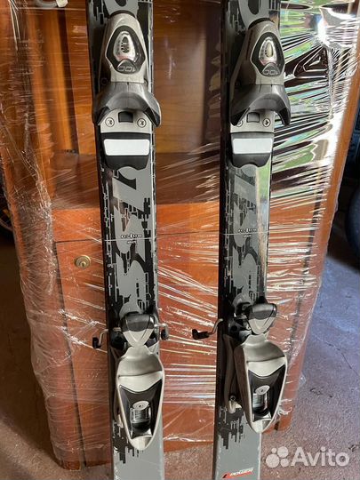 Горные лыжи и ботинки Rossignol