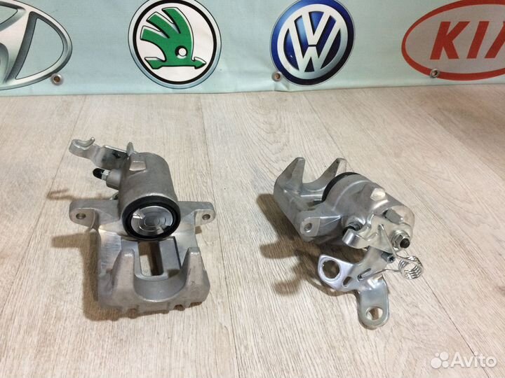 Суппорт тормозной задний Шкода А5 Ауди А3