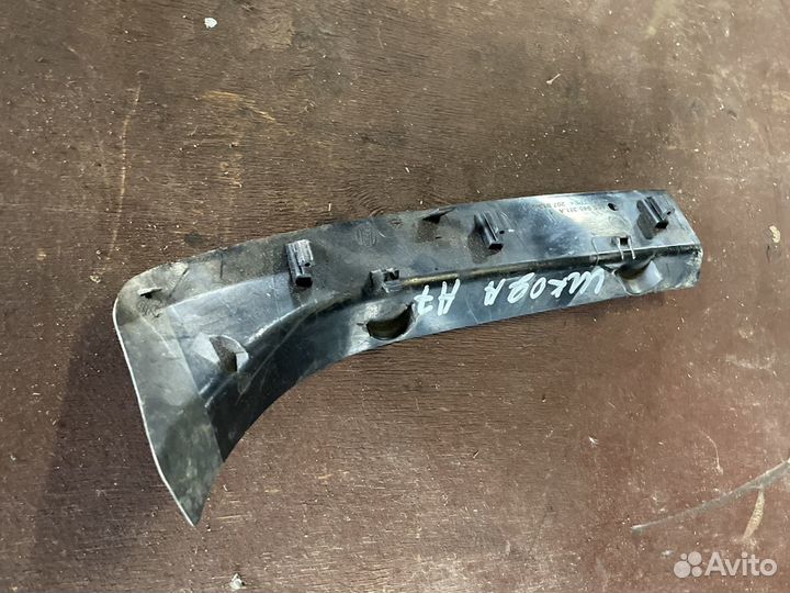 Накладка фонаря Skoda Octavia задняя левая