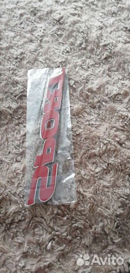 Шильдик Sport