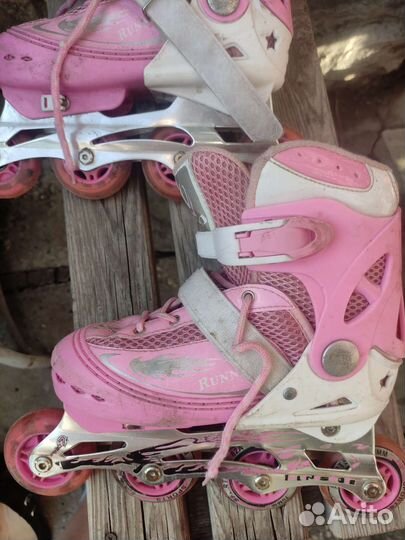 Роликовые коньки