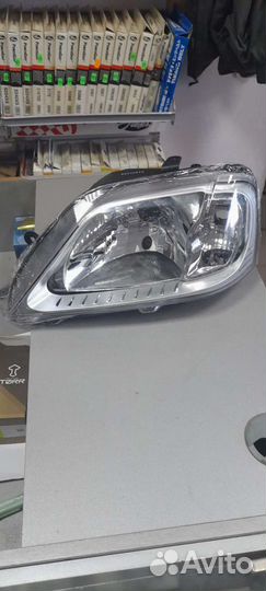 Фара левая хром Renault Logan 1