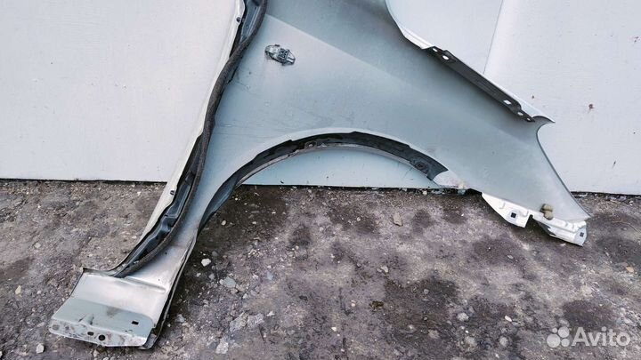 Крыло переднее левое Мазда Демио