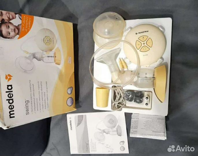 Молокоотсос medela электрический