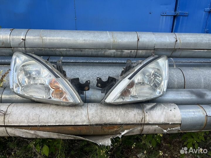 Фары на mitsubishi lancer 9