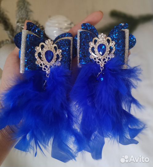 Бантики с перьями
