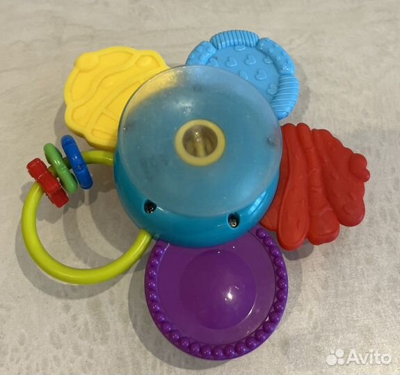 Погремушка цветок на липучке с прорезывателем